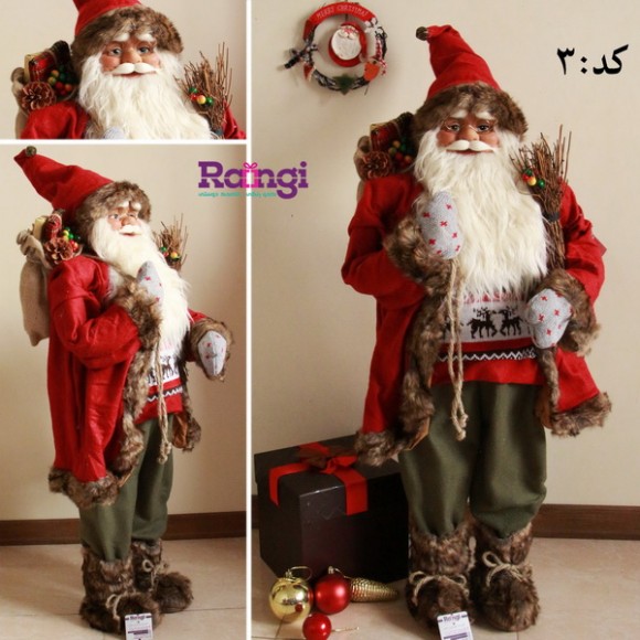 بابانوئل کریسمس قرمز با چوب اسکی
